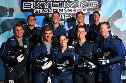 Air Force Teams Euphoria and Conundrum pose for a photo at the U.S. Parachute Assocation National Skydiving Championships 2013, which took place in Chicago from September 11-22, 2013.  The teams are a part of the Wings of Blue -- The U.S. Air Force Parachute Team.  The Wings of Blue are based out of the U.S. Air Force Academy, Colo., and operated by the 98th Flying Training Squadron, whose mission is to develop character and leadership in cadets through the sport of parachuting.  (Courtesy Photo)