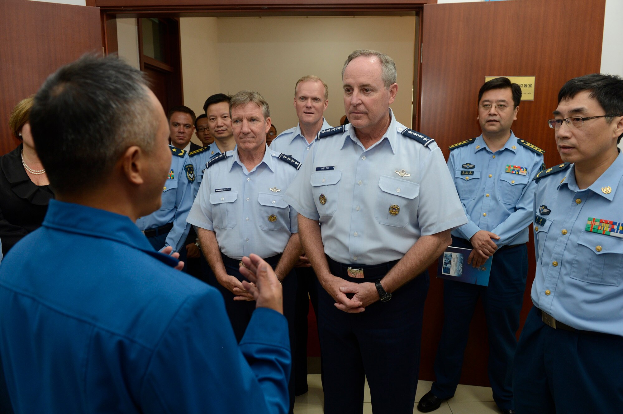 Air Force Chief of Staff Gen. Mark A. Welsh III, Gen. Herbert "Hawk" Carlisle, Pacific Air Forces commander, and Chief Master Sgt. of the Air Force James A. Cody tour the Chinese Air Force Aviation Medicine Research Institute Sep. 25, 2013, as part of their weeklong visit to China. (U.S. Air Force photo/Scott M. Ash)
