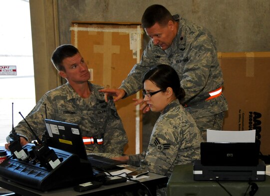 Maj. Duane Linn with the 133rd Airlift Wing, instructs Airmen on what he is expecting during the exercise, Boreas Reach, Duluth, Minnesota. The exercise simulated a terrorist incident in Duluth that resulted in civilian evacuations to the Twin Cities and Camp Ripley. The training partnered with 14 civilian agencies and utilized many of the 133AW capabilities to help both Airmen and civilians react better when facing disasters. (U.S. Air National Guard photo by Senior Airman Kari Giles.)