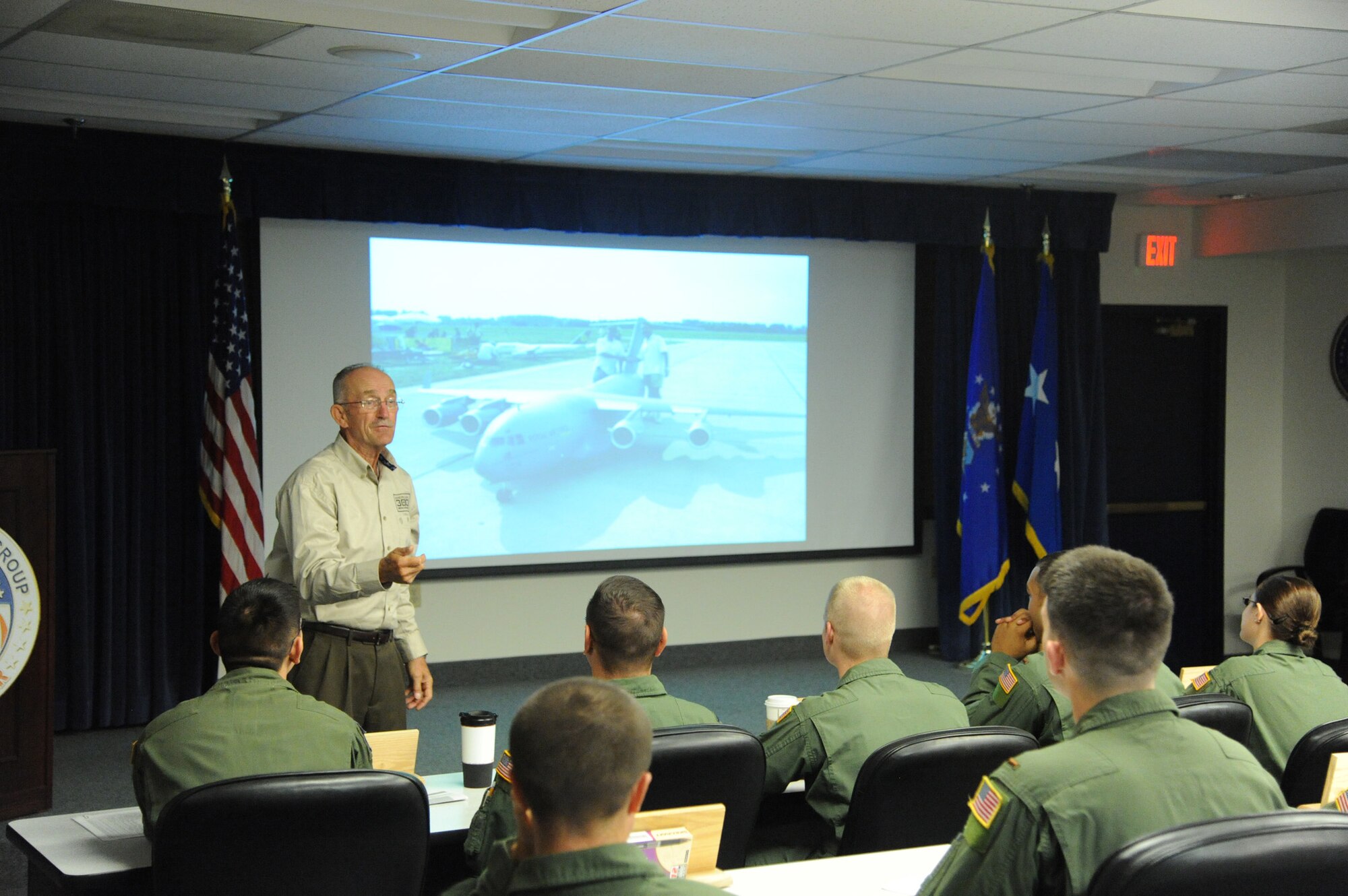 Maj. Gen. (ret.)  Edward Mechenbier, Air Force fighter pilot and Vietnam War prisoner of war, speaks with officers from the 341st Operations Group on Sept. 20 during an American300 visit. During the briefing Mechenbier shared his story with 341st OG members and expressed the traits he believed a leader should have and portray to the men and women he or she leads. (U.S. Air Force photo/Airman 1st Class Collin Schmidt)  