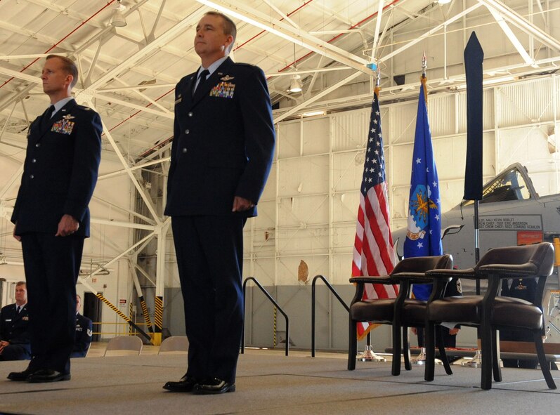 Col. Hubert Hegtvedt, 442nd Fighter Wing commander, Whiteman AFB, Mo., and Col John Breazeale, 917th Fighter Group commander, stand in front of the 917th FG guidon on Barksdale Air Force Base, La., Sept. 26, 2013. The 917th Wing was inactivated after 50 years on Barksdale. (U.S. Air Force photo/Senior Airman Kristin High) 