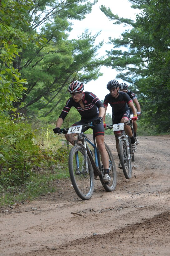 Senior Airman David Flaten competes in the Chequamegon Fat Tire Festival, Sept. 14, 2013,  just miles outside of his hometown in Wisconsin. The 811th Security Forces Squadron protective service member came in 16th place of 1,768 contestants in the annual, off-road mountain biking event. (Courtesy photo)
