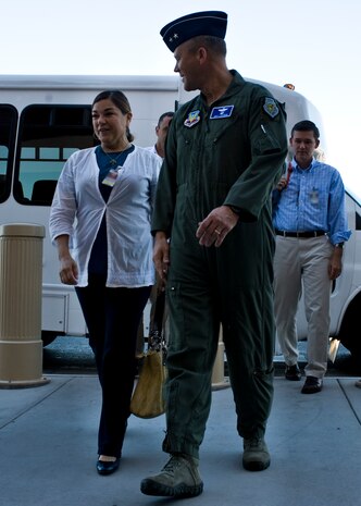 Maj. Gen. Jeffrey Lofgren, United States Air Force Warfare Center commander, greets Congresswoman Loretta Sanchez Sept. 24, 2013, at Nellis Air Force Base, Nev. Sanchez has represented California's 47th congressional district from 2003 to 2013 and the 46th district from 1997 to 2003. Sanchez was visiting to discuss the impact of sequestration at Nellis and Creech AFB. (U.S. Air Force photo illustration by Airman 1st Class Christopher Tam)