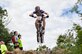 Senior Airman David Flaten executes a "bunny hop” or lifting up of both wheels of the bike off the ground, then exploding upward to clear any obstructions in one’s path, during the 2013 Conseil International Sport Militaire (CISM) cycling competition. The 811th Security Forces Squadron protective service member was selected to represent the United States Armed Forces for the cycling championship event held Sept. 2 to Sept. 6, in Leopoldsburg, Belgium. (Courtesy photo)