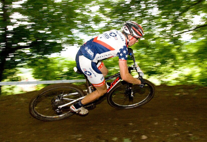 Senior Airman David Flaten showcases his professional biking skills during the 2013 Conseil International Sport Militaire (CISM) cycling competition. The 811th Security Forces Squadron protective service member was selected to represent the United States Armed Forces for the cycling championship event held Sept. 2 to Sept. 6, in Leopoldsburg, Belgium. (Courtesy photo)