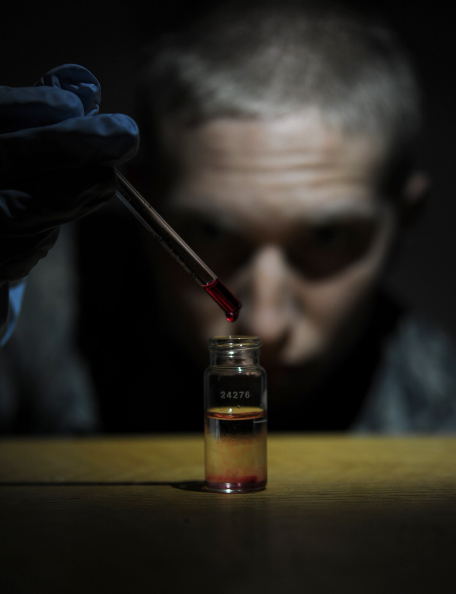 ALTUS AIR FORCE BASE, Okla. – U.S. Air Force Airman 1st Class Bart Bolin, 97th Medical Operations Squadron bioenvironmental engineering journeyman, checks the acidity of a water sample, Sept. 25. The bioenvironmental engineering flight gathers water samples quarterly to test for chemicals. Checking the pH levels within the water measures how acidic it is. (U.S. Air Force photo by Airman 1st Class Franklin R. Ramos/Released)