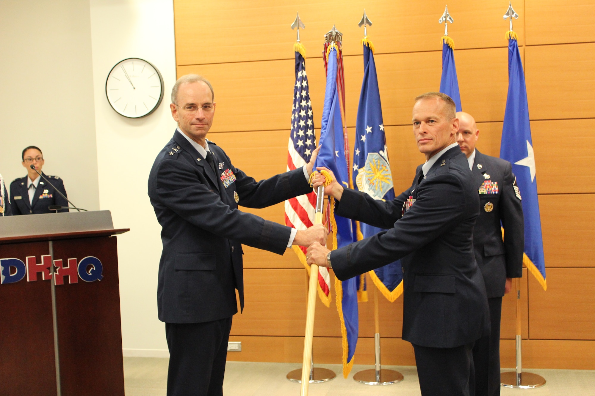 Maj. Gen. Mark A. Ediger, Deputy Air Force Surgeon General, officiates the promotion and change of command ceremony of Brig. Gen. James E. McClain, the new Commander, Air Force Medical Support Agency, at the Defense Health Headquarters in Falls Church, Va. on Sept. 26, 2013.  General McClain also will serve as the 17th Biomedical Sciences Corps chief  and Assistant Surgeon General for Modernization, where he oversees daily operations of the Modernization Directorate for requirements, aerospace medicine and information management and technology for the AFMS. (U.S. Air Force photo / Jon Stock)