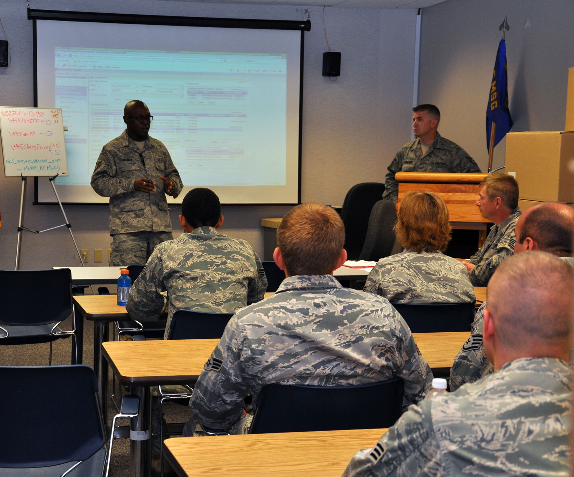 WRIGHT-PATTERSON AIR FORCE BASE, Ohio – Tech. Sgt. Jermaine Coleman, 445th Force Support Squadron, chief of information systems, explains to 445th Airlift Wing job swap participants the role and function of the 445th Communications Element during the Sept. 8 445th FSS job swap. (U.S. Air Force photo/Capt. Demetrius Smith)
