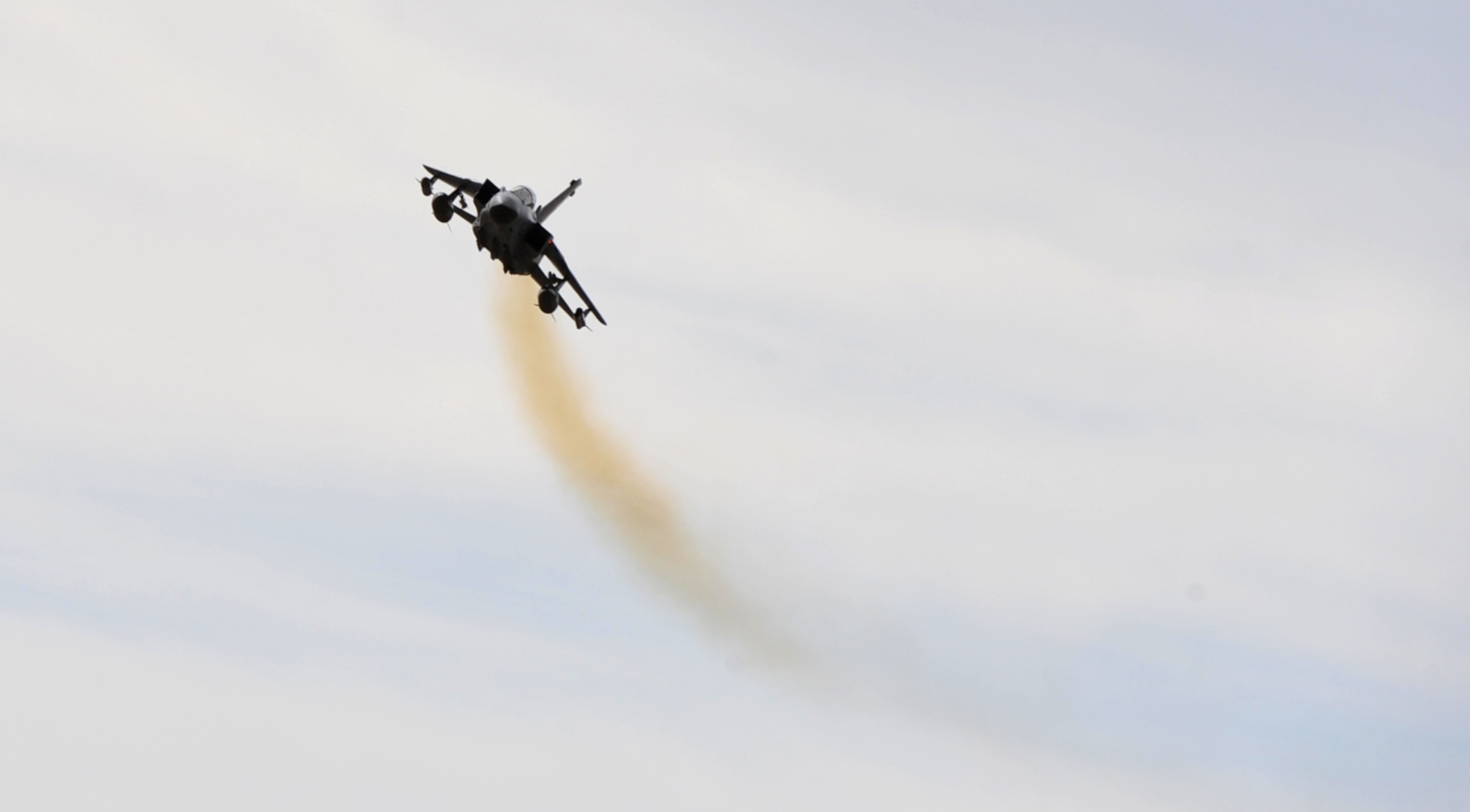 A German air force PA-200 Tornado prepares to simulate an attack on ground personnel during exercise Mountain Roundup 2012, at Mountain Home Air Force Base, Idaho. The German Air Force and several other branches of service are participating in this two week exercise, which will provide the Germans their final step in their pilot training. (U.S. Air Force photo by Senior Airman Heather Hayward/RELEASED)