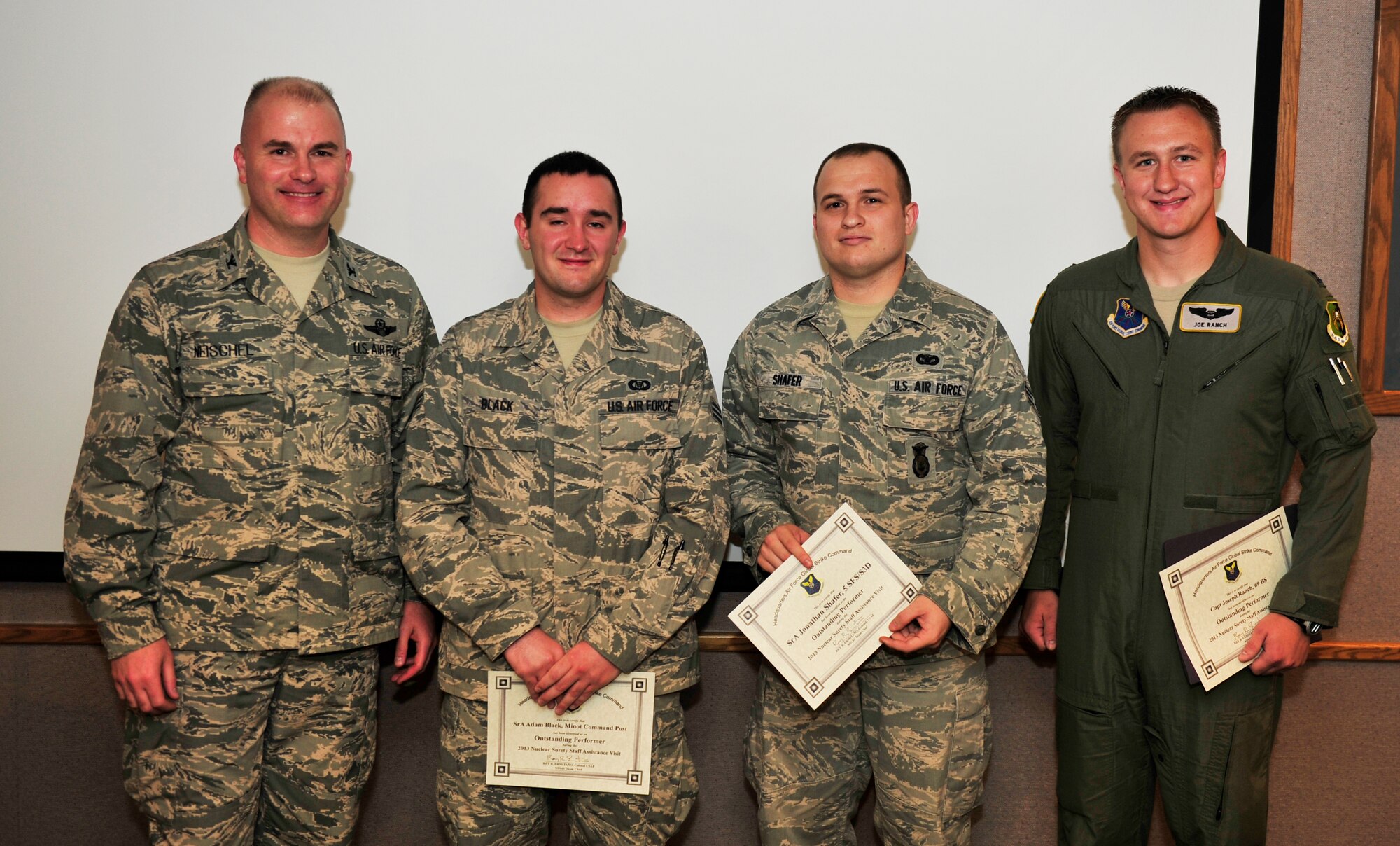 Congratulations to the Airmen from the 5th Bomb Wing who were recognized and coined by Col. Jeffrey Neischel, 5th Bomb Wing vice commander, at Minot Air Force Base, N.D. Sept 18, 2013. They were recognized for their outstanding performances during the Nuclear Surety Staff Assistance Visit which occurred Sept. 8-16. (U.S. Air Force photo/Airman 1st Class Kristoffer Kaubisch)