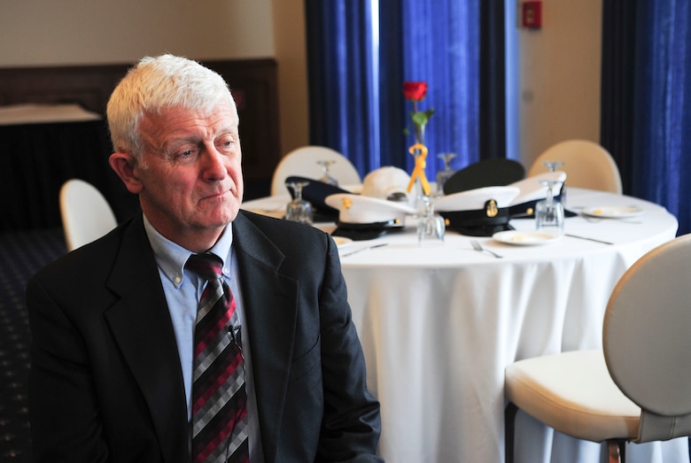 Air Force Lt. Col. (ret.) Paul Needham talks about his time in captivity after a luncheon, Sept. 18, 2013, Ramstein Air Base, Germany. The luncheon was held in memory of prisoners of war and those missing in action and Needham was invited to be the guest speaker to tell his story to Airmen and enhance their resiliency. Needham was captured Nov. 4, 1979 by Iranian terrorists who over the United States Embassy in Teheran, Iran. (U.S. Air Force photo/Senior Airman Hailey Haux)