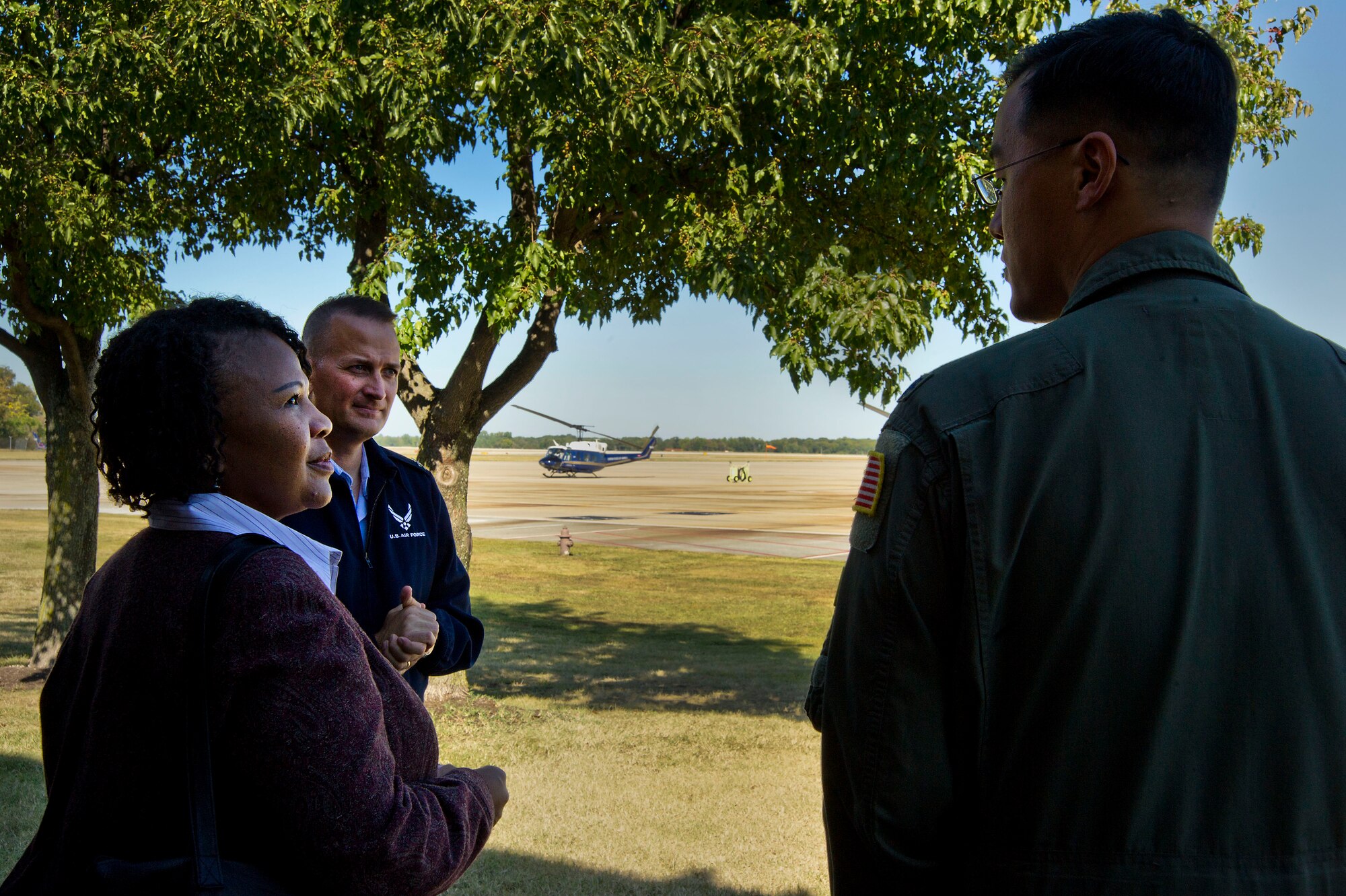 Col. William M. Knight (left) and Lt. Col. Tim Buck discuss the mission of the 1st Helicopter Squadron to Maryland Delegate Melony Griffith from District 25 during an orientation tour of Joint Base Andrews, Md., Sept. 25, 2013. Knight is the11th Wing commander and Buck is the 1st HS commander. (U.S. Air Force photo/ Tech. Sgt. Tammie Moore)