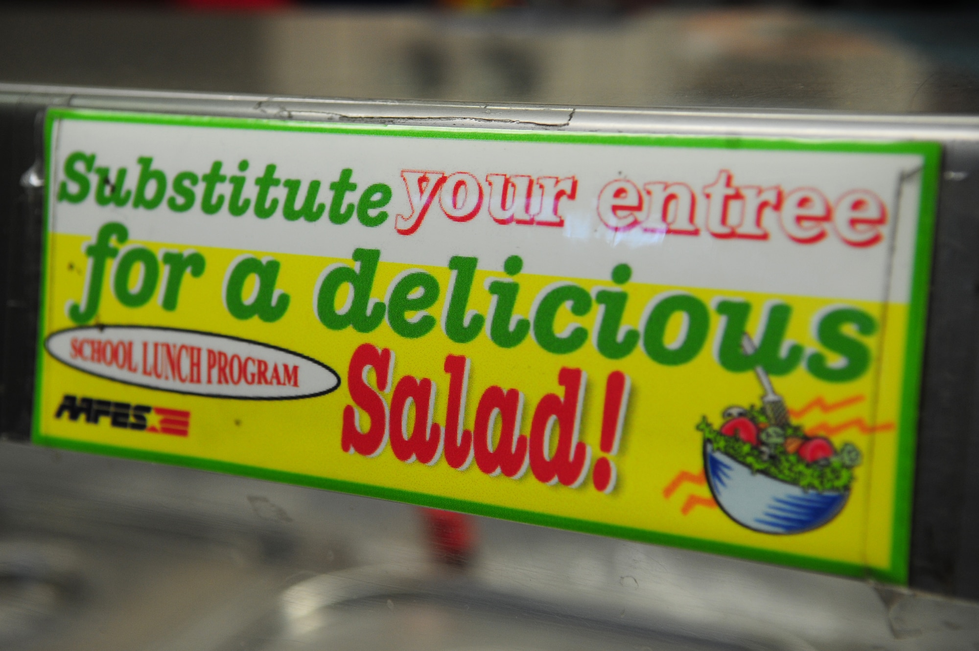 A sign encourages children to make healthy choices while going through the lunch line Sept. 17, 2013, Vogelweh, Germany. (U.S. Air Force photo/Senior Airman Hailey Haux)