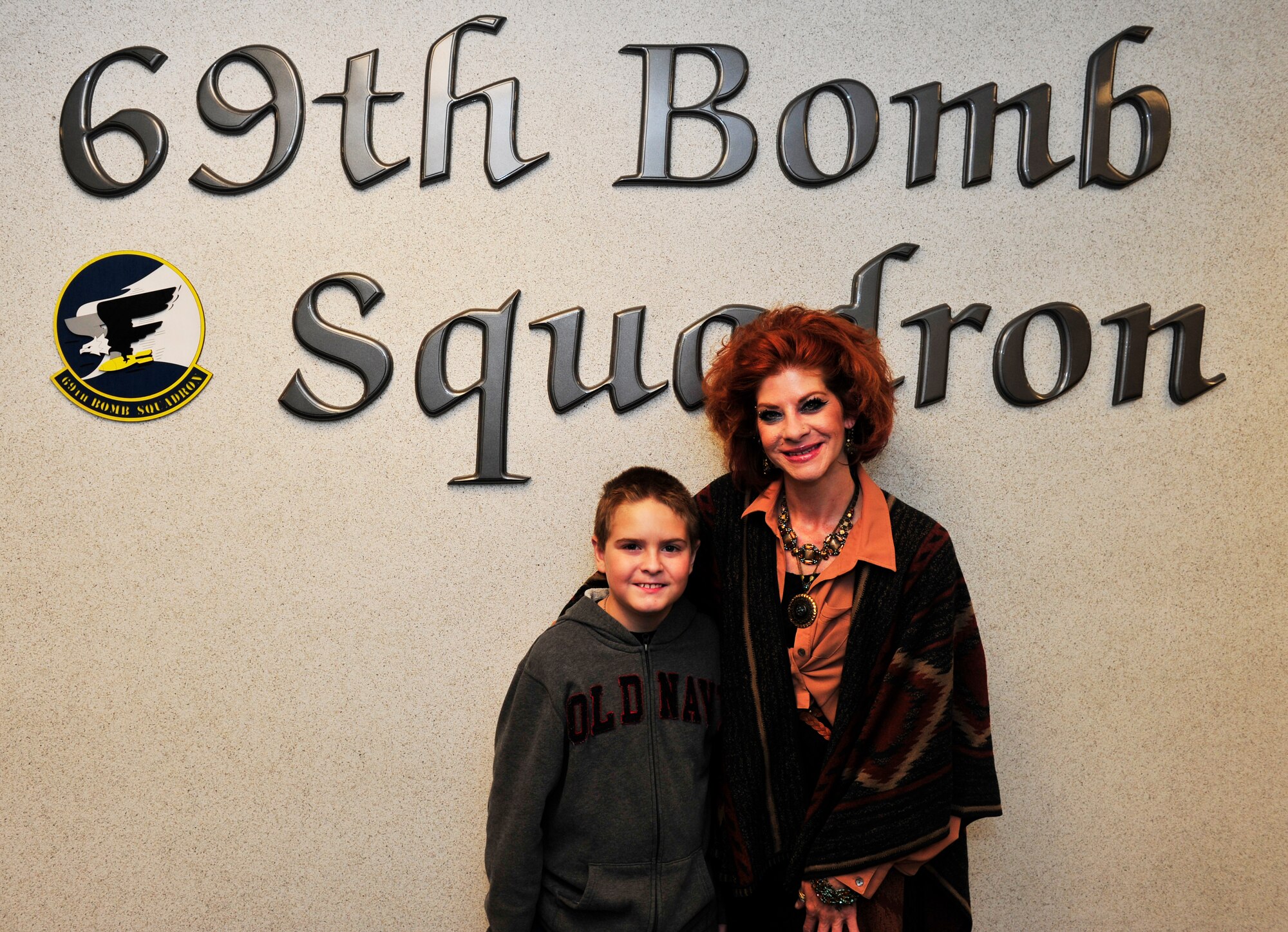 The wife and son of former B-52G Stratofortress tail gunner, Lee Persing, visited Minot Air Force Base, Sept. 18 – 20.  Robbin Persing and her son, Brennan, both experienced a unique opportunity when they visited up close the aircraft that left such a profound impression in the life of Lee. He had served with the 69th Bomb Squadron in the late 1980s, at Loring AFB, Maine. (U.S. Air Force photo/Airman 1st Class Kristoffer Kaubisch)
