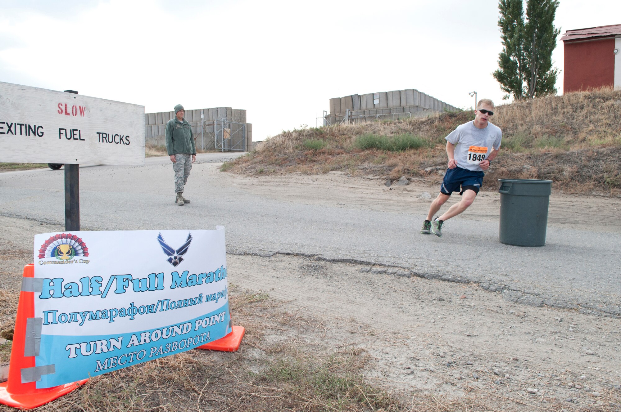 Staff Sgt. Daniel Barnhorst reaches a turn-around point during the Air Force Marathon at Transit Center at Manas, Kyrgyzstan, Sept. 21, 2013. Barnhorst is an Expeditionary Theater Distribution Center customer service representative for the 376th Expeditionary Logistics Readiness Squadron, deployed out of Holloman Air Force Base, N.M., and a native of El Paso, Texas. (U.S. Air Force photo/Staff Sgt. Robert Barnett)