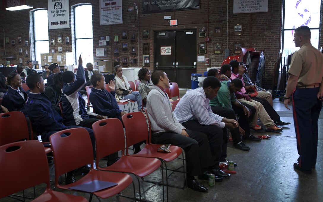 Capt. Michael R. Schulz, chief instructor of the Marine Corps Leadership Seminar, leads a group discussion on leadership methods, decision-making, and command presence. Dr. Kenneth D. Dunn, the director of the Marine Corps Leadership Seminar, and his team take the leadership seminar to colleges and universities all over the country in efforts of improving diversity in the Marine Corps. 