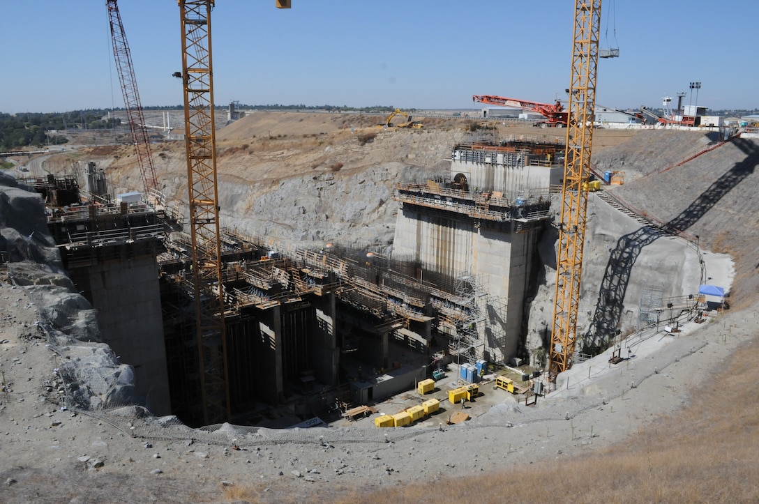 Construction continues on the Folsom Dam auxiliary spillway control structure in Folsom, Calif., shown Sept. 10, 2013. The Folsom Dam auxiliary spillway project is a joint effort of the U.S. Army Corps of Engineers Sacramento and the U.S. Bureau of Reclamation to reduce flood risk for the Sacramento area and improve Folsom Dam’s safety. 