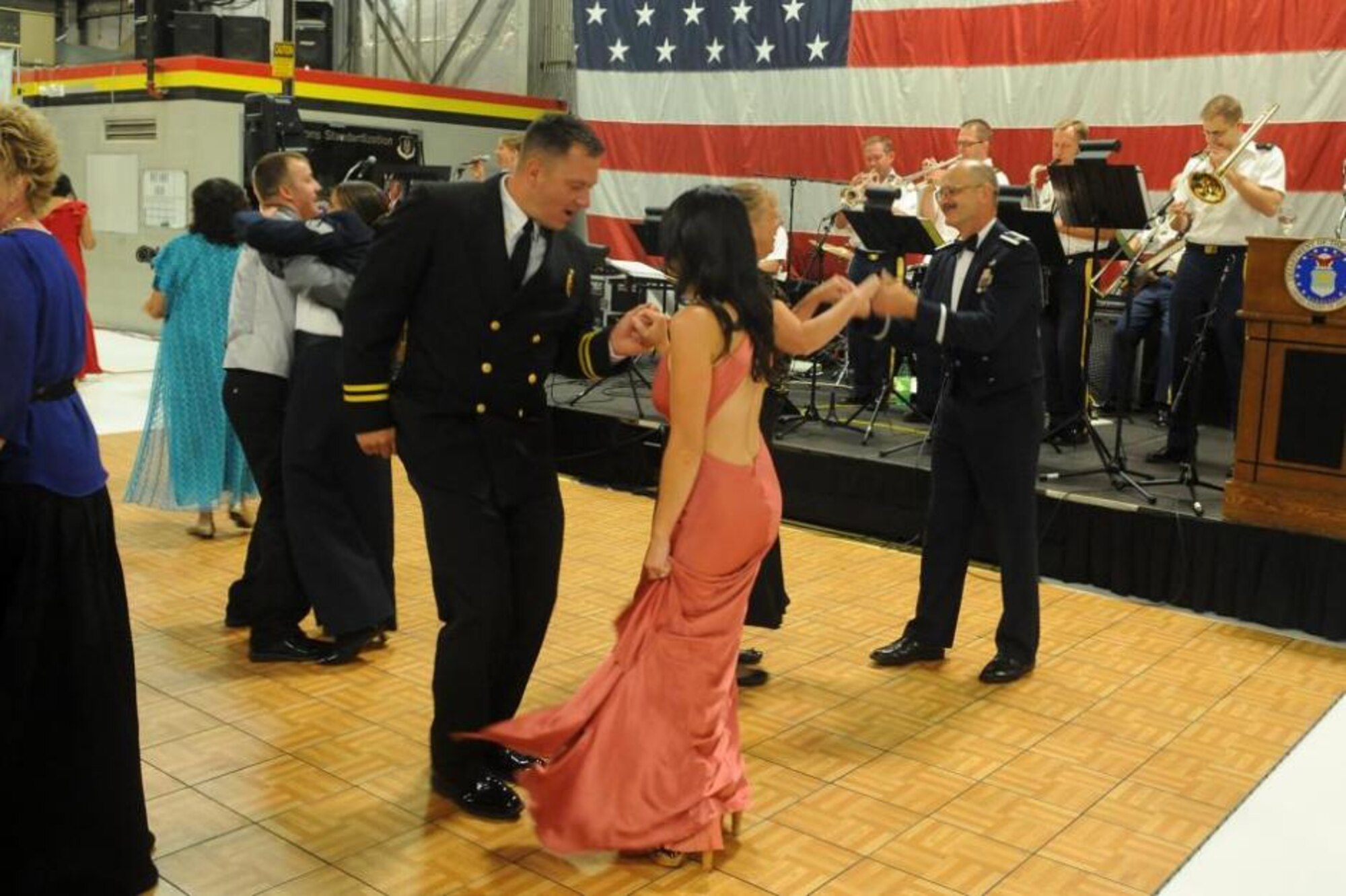 Aaron Butler, a fireman with the 775th Civil Engineer Squadron, dances with his wife, Sunshine, during the Air Force Ball at Hill Air Force Base, Utah, Sept. 20. The 23rd Utah National Guard Band provided a full night of music entertainment. (U.S. Air Force photo by Alex R. Lloyd/Released)

