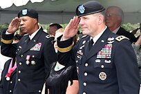 Maj. Gen. Adolph McQueen Jr. (left), deputy commanding general for support, U.S. Army North (Fifth Army), salutes the colors of the nation for the last time alongside Lt. Gen. Perry Wiggins, commanding general for Army North and senior Army commander for Fort Sam Houston and Camp Bullis, during his retirement ceremony Sept. 17 in the historic Quadrangle. McQueen enlisted in the U.S. Marine Corps in 1971 and was directly commissioned into the Michigan National Guard in 1982. (Photo by Staff Sgt. Corey Baltos, U.S. Army North Public Affairs)