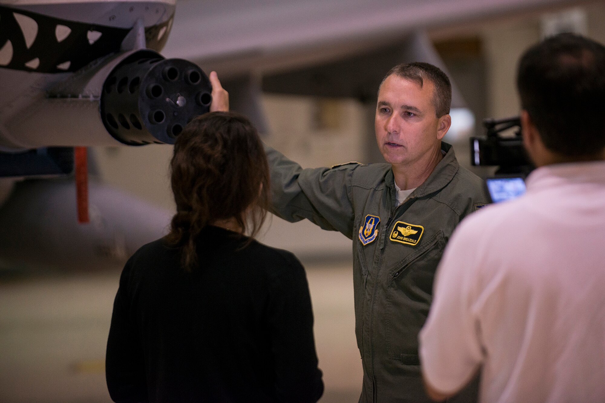 U.S. Air Force Col. John Breazeale, 917th Fighter Group (FG) commander, talks to local media about the capabilities of the A-10 Thunderbolt II during an interview, Sept. 26, 2013, Barksdale Air Force Base, La. Breazeale is the last commander of the FG, which is scheduled to be inactivated later today. (U.S. Air Force photo by Master Sgt. Greg Steele/Released)
