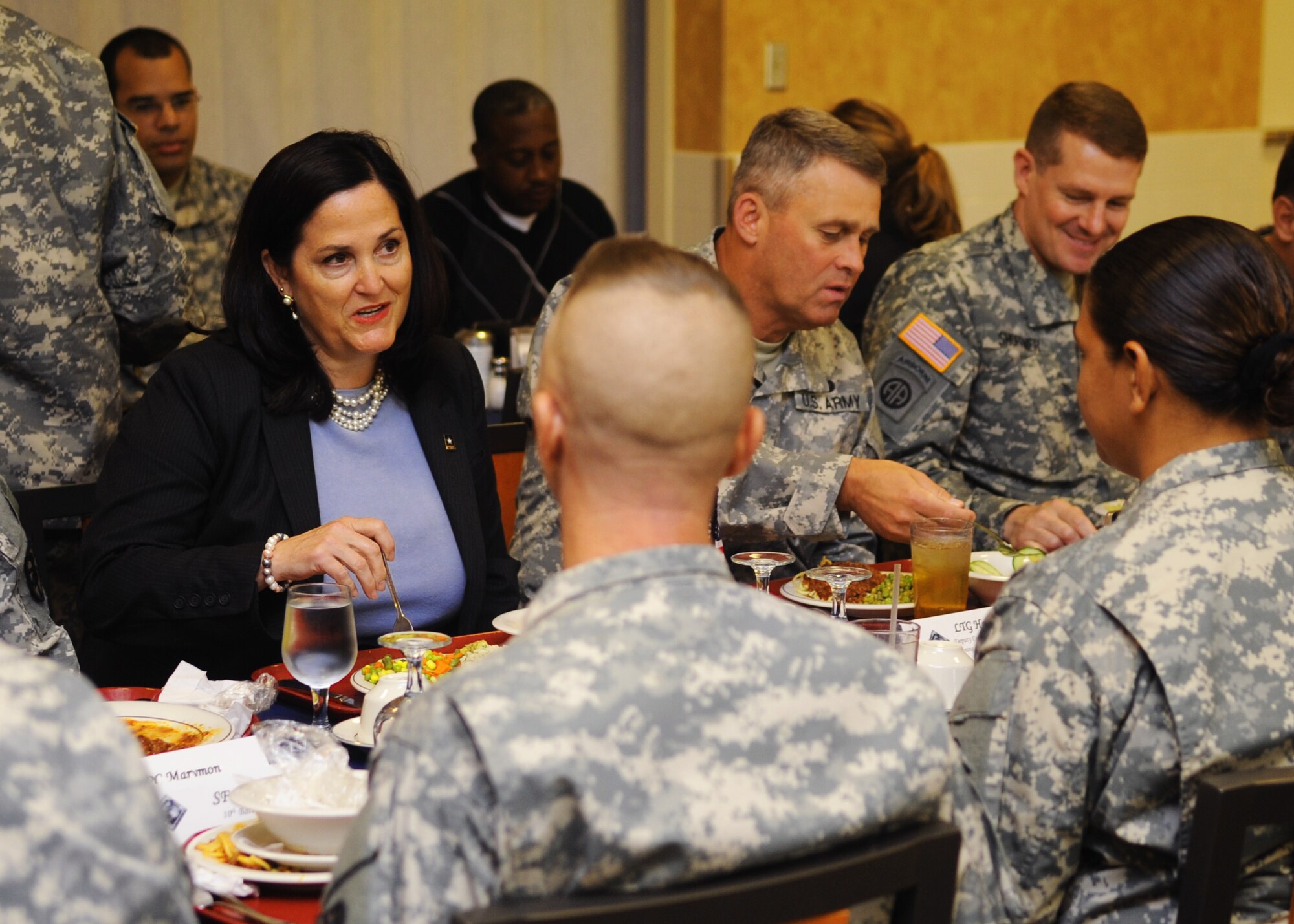 Katherine Hammack, U.S. Army Installations, Energy and Environment assistant secretary, talks with Soldiers during lunch at Fort Eustis, Va., Sept. 25, 2013. Hammack toured the installation, attending briefings on the challenges and triumphs of Fort Eustis. (U.S. Air Force photo by Airman 1st Class Austin Harvill/Released)