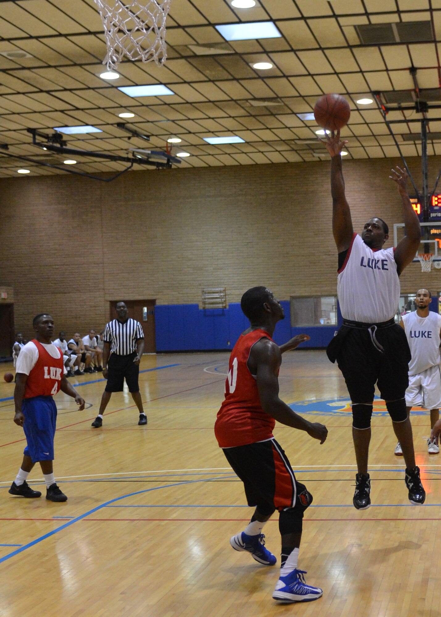 Lamar Grimes, 56th Force Support Squadron recreation aide, shoots a floater Sept. 17 during the intramural basketball championship game at Luke Air Force Base. Grimes made the shot, adding two points to the FSS score. (U.S. Air Force photo/Airman 1st Class Devante Williams)