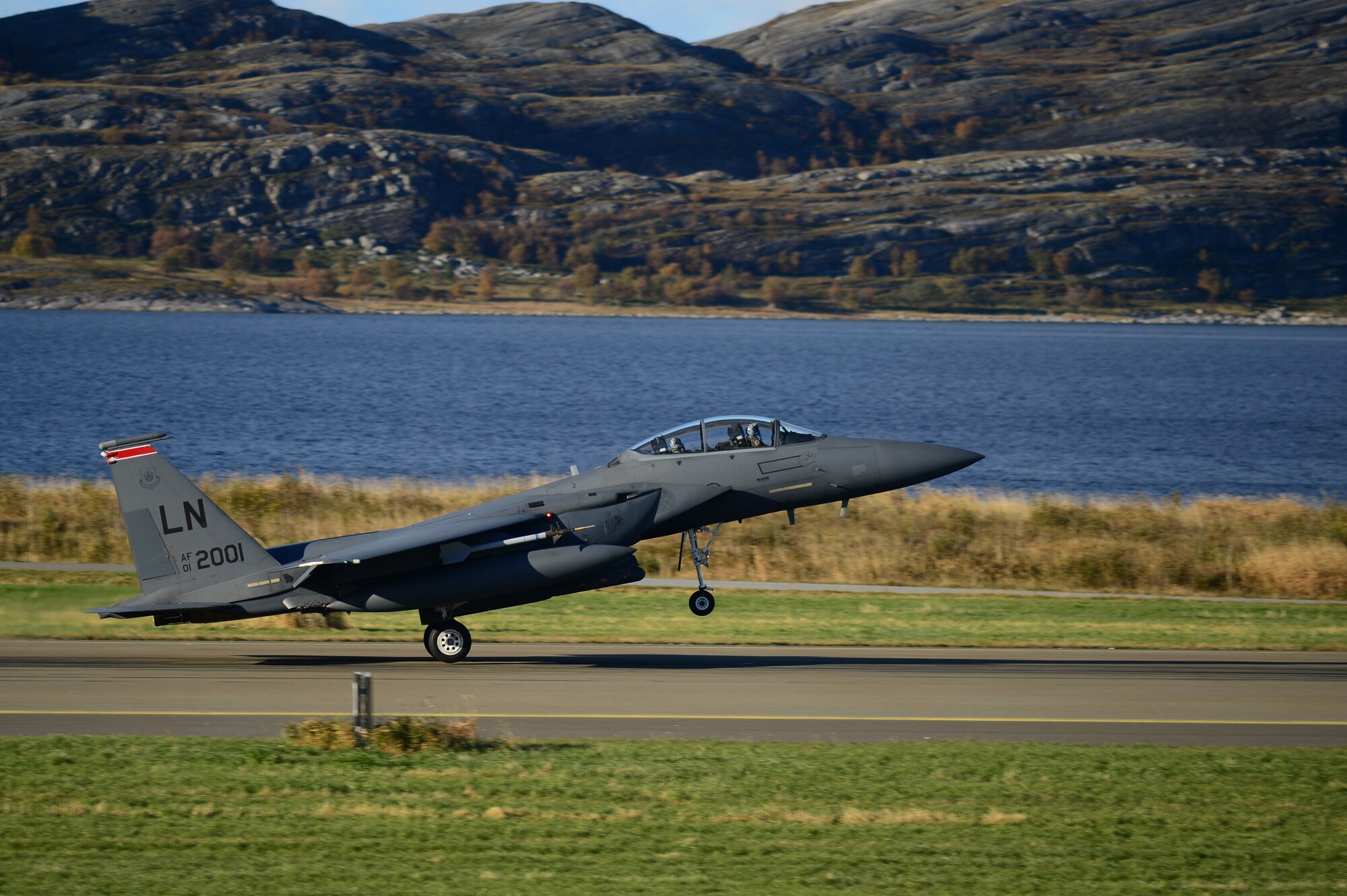 An F-15E Strike Eagle assigned to the 494th Fighter Squadron returns to Bodø Main Air Station, Norway, Sept. 24, 2013. Approximately 30 aircraft deployed from RAFs Lakenheath and Mildenhall to multiple locations in Norway in support of the Arctic Challenge Exercise 2013. ACE-13 was a combined exercise with NATO and regional allies, which promoted continued interoperability between the United States, Norway, Sweden, Finland, United Kingdom and NATO. (U.S. Air Force photo by Master Sgt. Lee Osberry/Released)