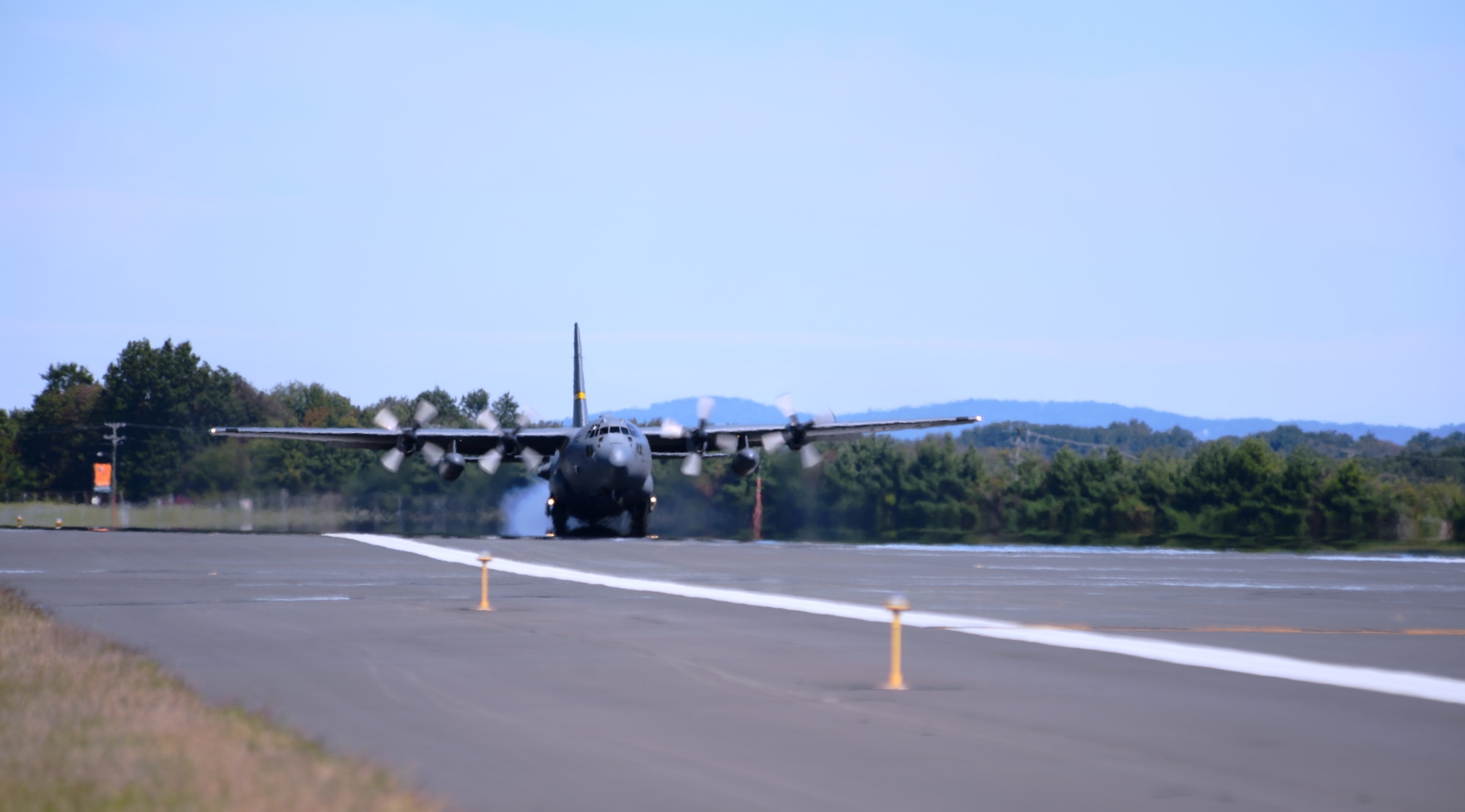 The first of eight C-130H aircraft to be assigned to the Connecticut Air National Guard’s 103rd Airlift Wing touches down at Bradley International Airport, Windsor Locks, Conn., Tuesday, Sept, 24, 2013. (U.S. Air National Guard photo by Master Sgt. Erin McNamara)