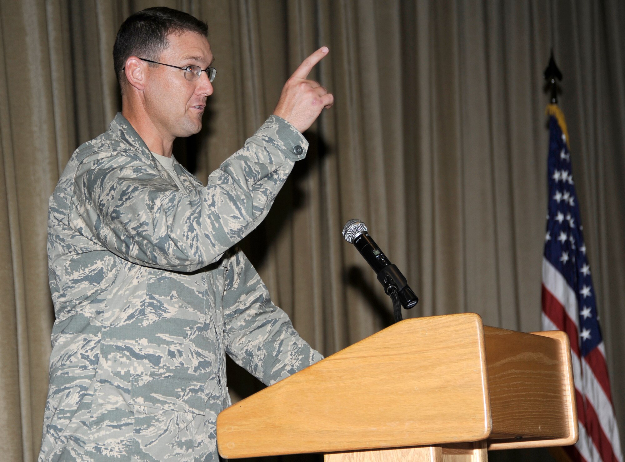 Lt. Col. Daniel P. Johnstone, 387th Air Expeditionary Squadron commander speaks to the members in attendance during his assumption of command ceremony at an undisclosed location in Southwest Asia September 27, 2013. (U.S. Air Force photo by Master Sgt. Christopher A. Campbell)