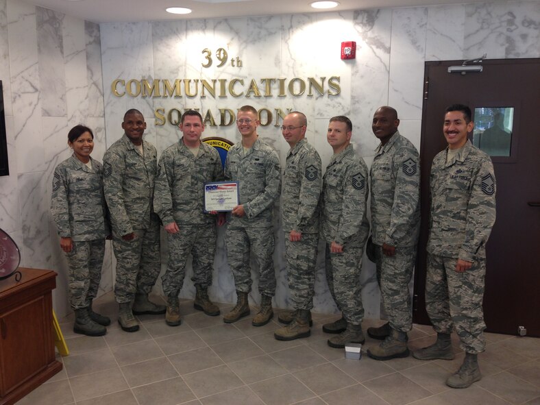 Senior Airman Spencer Lanham, 39th Communications Squadron radio frequency transmission technician, was recognized as the August Diamond Sharp Award winner by the Incirlik First Sergeant's Council in front of members of the 39th CS Sept. 10, 2013, at Incirlik Air Base, Turkey. Lanham volunteered to set up an electrostatic discharge protected table that was previously identified as not in compliance and provided training for multiple members of the 39th Logistics Readiness Squadron, arming the members for a performance evaluation, which was noted as "perfect" by one inspector during the Logistics Compliance Assessment Program. (Courtesy photo/Released)