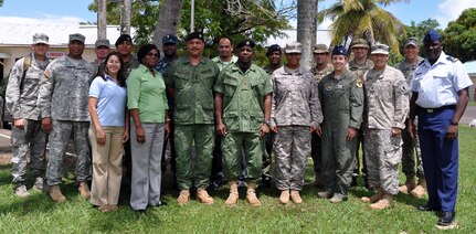 Members of Joint Task Force-Bravo's Central America Survey and Assessment Team (C-SAT) pose with representative from the Belize Defence Forces, the British Army, the National Emergency Management Organization (NEMO) and the Office of Foreign Disaster Assistance (OFDA) in Belize, Sept. 27, 2013.  The C-SAT participated in a disaster response exercise with a focus on increasing the coordinatino between the various military and disaster response entitites in order to alleviate human suffering in the event of a real world disaster.  (U.S. Air force photo by Capt. Zach Anderson)