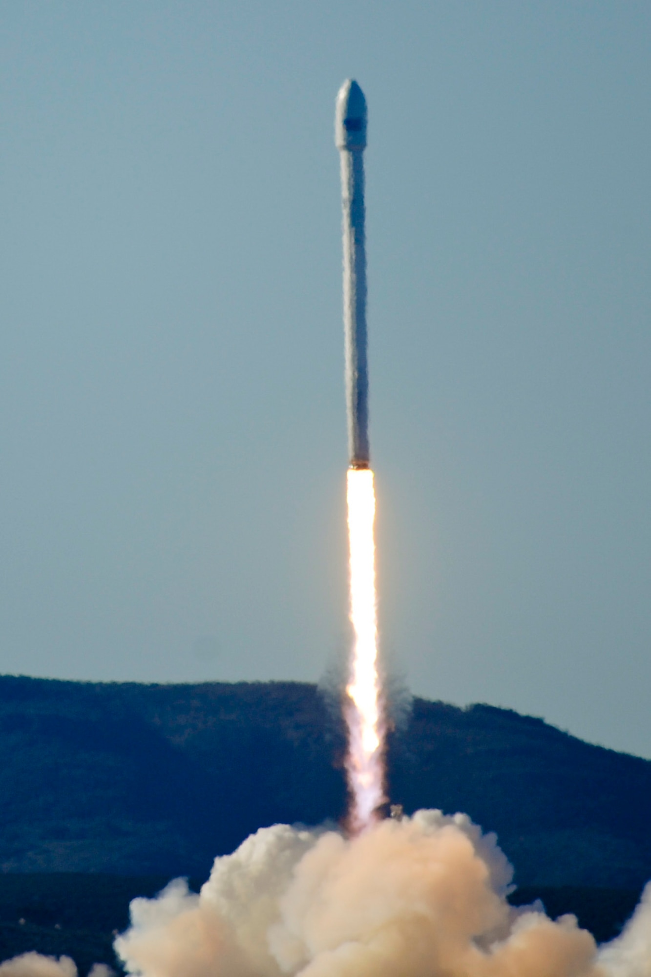 VANDENBERG AIR FORCE BASE, Calif. – Team Vandenberg launches its first-ever SpaceX launch from Space Launch Complex-4 here Sunday, Sept. 29, 2013. 30th Space Wing's 1st Air and Space Test Squadron was the lead for all launch site certification activities at Vandenberg for SpaceX as an Evolved Expendable Launch Vehicle New Entrant. Under the authority of the Space and Missile Systems Center, the Squadron evaluated SpaceX's flight and ground systems, processes and procedures for this inaugural space launch campaign for the upgraded Falcon-9 rocket.