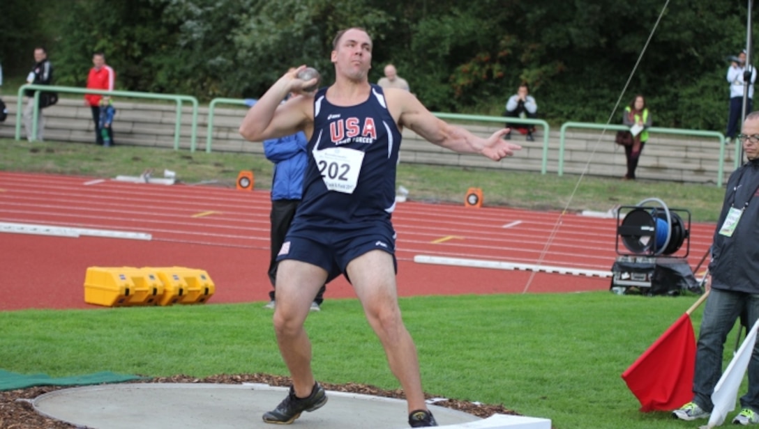 Marine SSgt Kenneth Perio competing in the Shot Put (UBI) of the 2013 CISM Open Integrated/Para Track and Field Championship in Warendorf, Germany 9-16 September.  Perio threw for 12.00m earning the gold medal.
