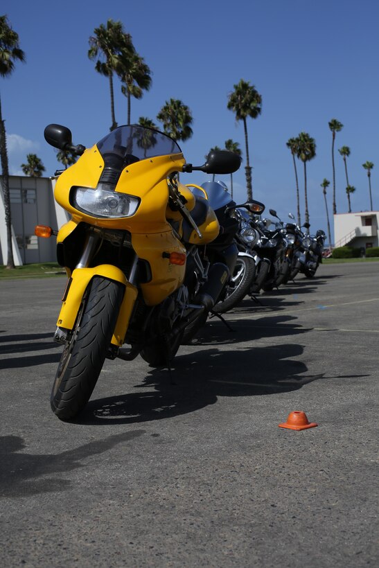 Motorcycles stand lined up during a Basic Riders Course (BRC) lecture aboard Marine Corps Base Camp Pendleton, Calif., Sept. 26, 2013. Military members are required to attend the BRC to qualify them to ride a motorcycle. (Marine Corps photo by Cpl. Jamean R. Berry/released)