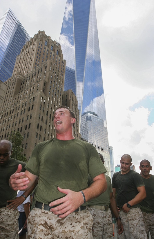 Medal of Honor recipient Sgt. Dakota Meyer gives a speech as Marines of the 1st Marine Corps District stand around him after the Tunnel to Towers run in Manhattan Sept. 29.  Tunnel to Towers, a 5-kilometer run, is held annually in honor of firefighter Stephen Siller.  Siller, who ran to the World Trade Center through the Battery Tunnel with all his gear on during the attacks on 9/11, ultimately lost his life during his attempt to save others.  (U.S. Marine Corps photo by Sgt. Caleb Gomez).