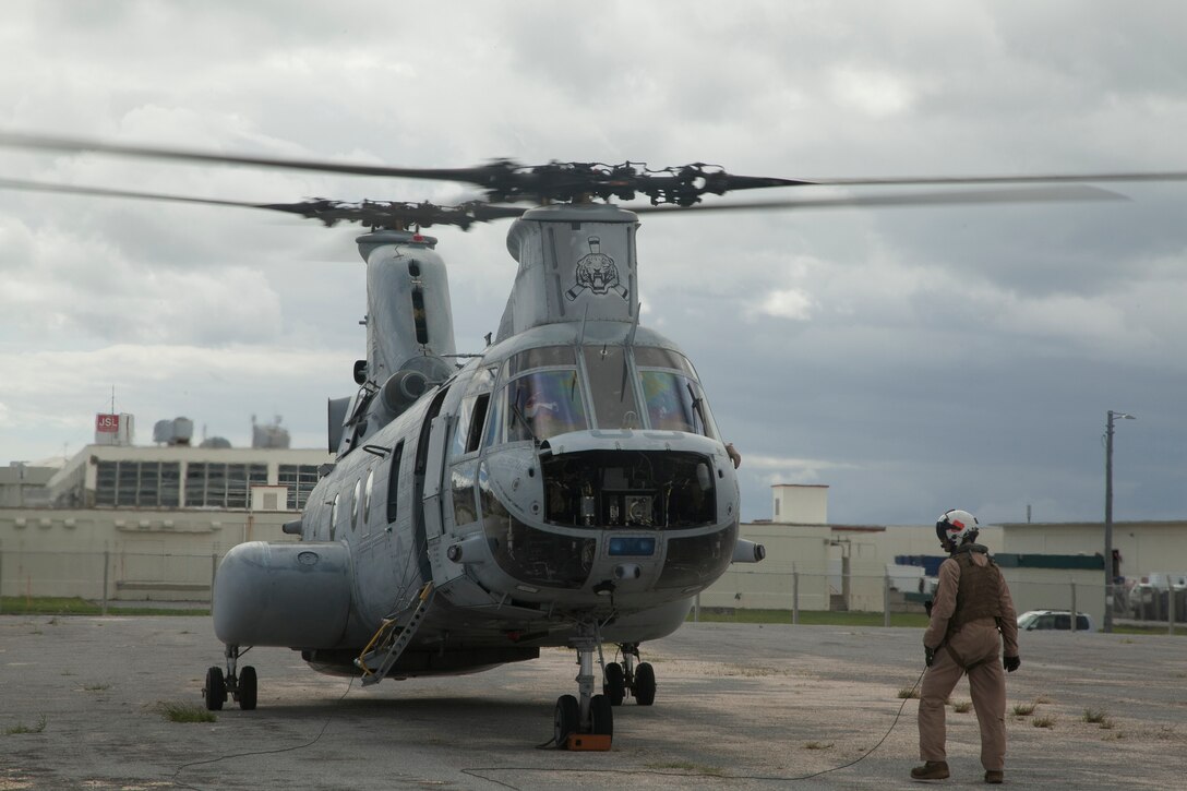 Lance Cpl. Ranieri A. Rotelli checks the CH-46E after it lands on Camp Kinser Sept. 30 after its last flight over Okinawa. The CH-46E Sea Knight, affectionately called “the Phrog,” has served with the Marine Corps and Marine Medium Tiltrotor Squadron 262 since the Vietnam War. The VMM-262 “Flying Tigers” have used the CH-46 to participate in engagements such as Operation Iraqi Freedom in Iraq, Operation Unified Assistance in Southeast Asia, and, most recently, Operation Tomodachi in response to the Great East Japan Earthquake and subsequent tsunami. After serving faithfully for decades, the Phrog’s service has ended, paving the way for the MV-22B Osprey to take over. Rotelli is an aircrew chief with VMM-262, Marine Aircraft Group 36, 1st Marine Air Wing, III Marine Expeditionary Force.