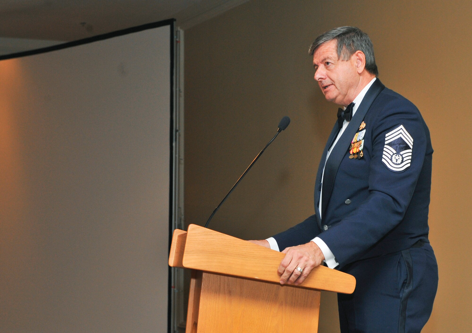 Retired Chief Master Sgt. of the Air Force David J. Campanale addresses attendees during the Air Force Ball Sept. 27, 2013, at the Renaissance Hotel in Denver. This year’s celebration marked the 66th Air Force birthday and paid respects to 1st Lt. John Harold "Buck" Buckley the base’s namesake, who was killed during World War I 95 years ago. (U.S. Air Force photo by Senior Airman Phillip Houk/Released)