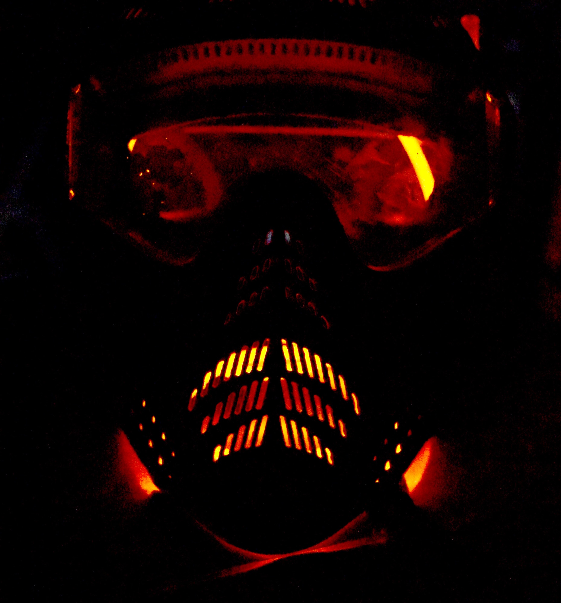 Team Barksdale members wore paintball masks for safety during a nighttime Zombie Apocalypse paintball game on Barksdale Air Force Base, La., Sept. 28, 2013. More than 100 Team Barksdale members participated in the game held on the East Reservation on base. (U.S. Air Force photo/Staff Sgt. Amber Corcoran)