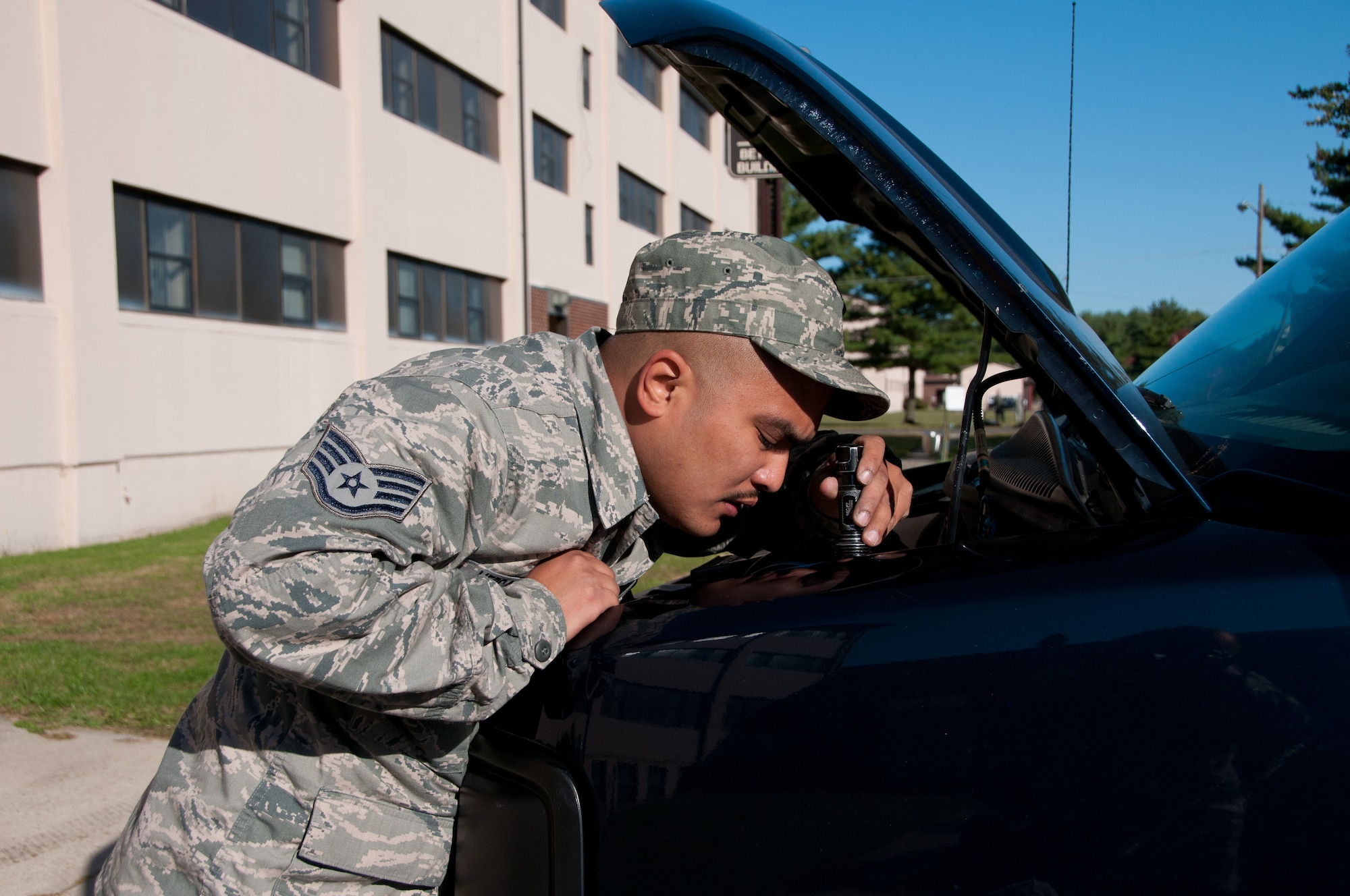 Staff Sgt. Daniel Vergara, 108th Logistics Readiness Squadron, inspects a vehicle  during the annual Quick Response Force (QRF) training September 29, 2013, at Joint Base McGuire-Dix-Lakehurst, N.J. QRF training teaches Guard members how to deal with disturbances when called to duty for civil support. (U.S. Air National Guard photo by Senior Airman Adrian R. Rowan)