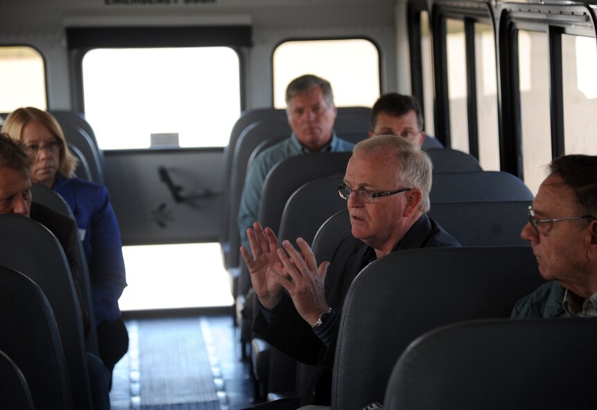 Grand Forks County Commissioner John Schmisek discusses a proposed Enhanced Use Lease project during a tour on Grand Forks Air Force Base, N.D., Sept. 19, 2013. The county of Grand Forks, in cooperation with the Base Realignment Impact Committee and the Center for Innovation, is negotiating with the Air Force to lease land for a proposed state-of-the-art aviation business and technology park (U.S. Air Force photo by Tim Flack) 