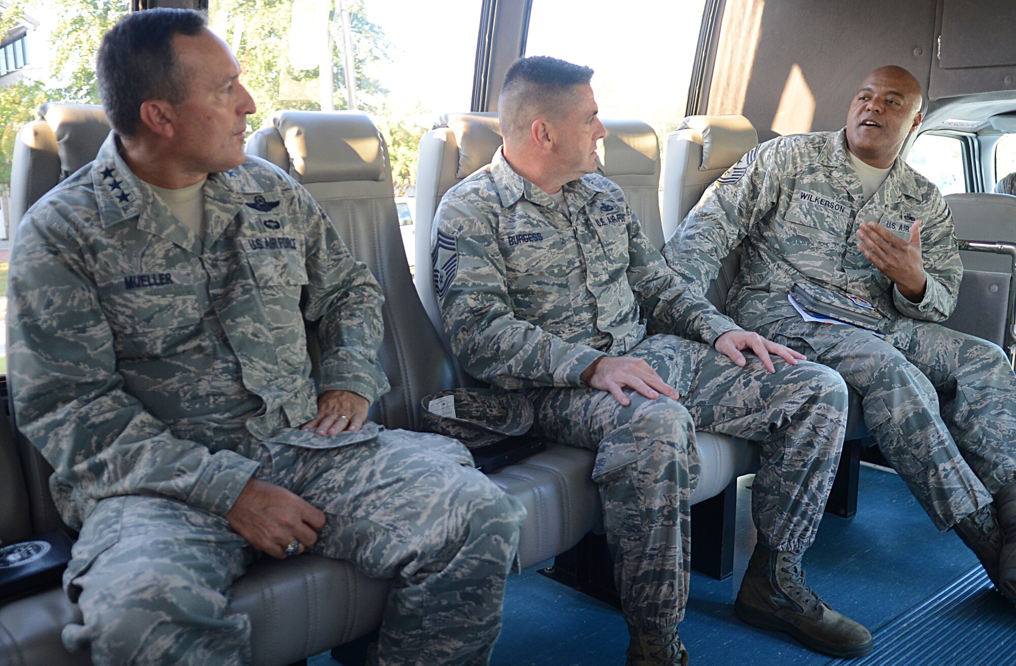 U.S. Air Force Lt. Gen. Stephen Mueller, the Air Force Inspector General, U.S. Air Force Chief Master Sergeant Charles J. Burgess III, the Chief Enlisted Manager with the Secretary of the Air Force Inspector General, and U.S. Air Force Chief Master Sergeant James Wilkerson, the 20th Fighter Wing command chief, discuss current issues at Shaw Air Force Base during Mueller’s tour of Shaw on Sept. 24, 2013. Mueller met with Airmen and got feedback on issues that Airmen face every day. (U.S. Air Force photo by Airman 1st Class Jonathan Bass/Released)