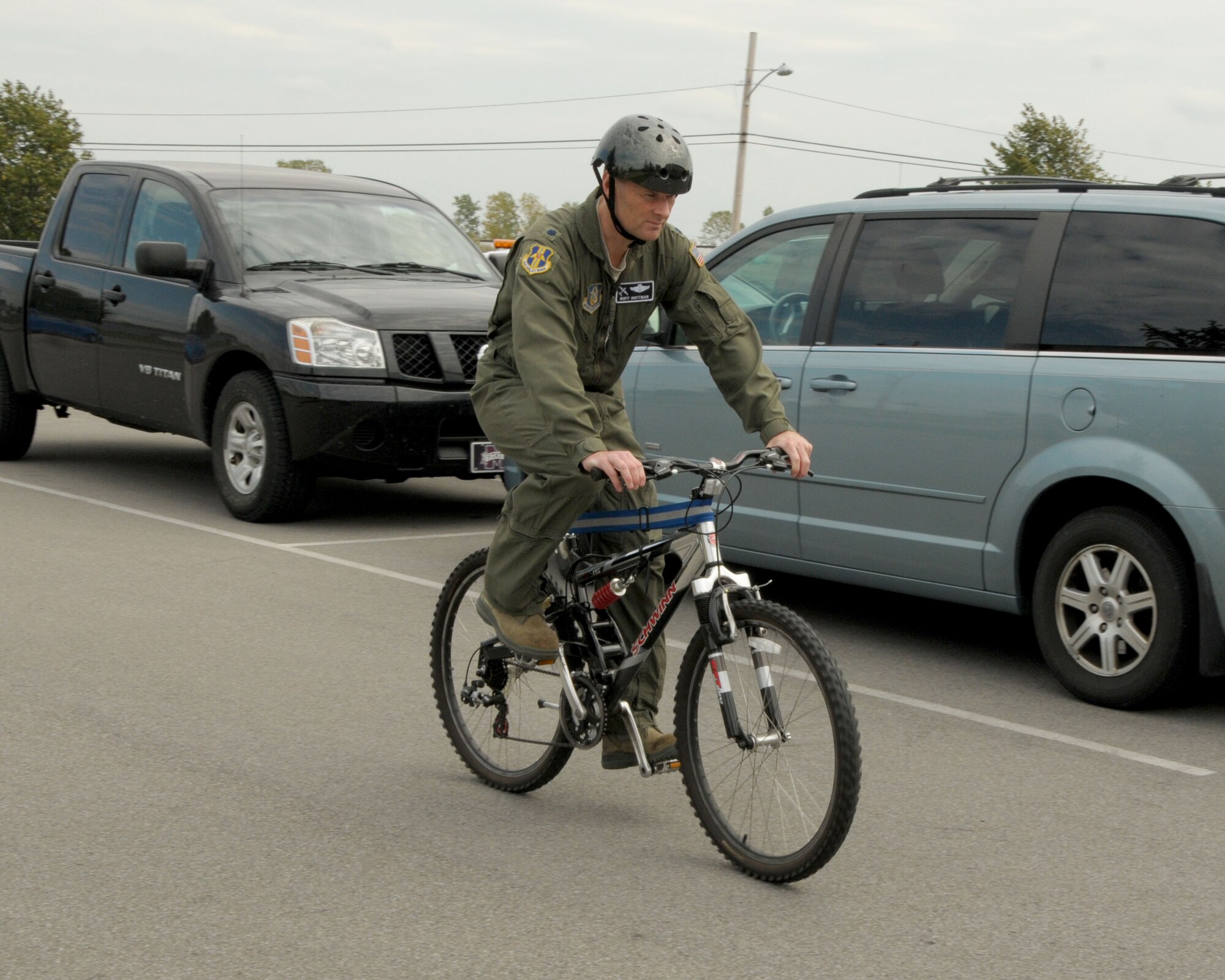 Lt. Col. George Hoffman, 914th Airlift Wing Chief of Safety uses pedal power on September 30, 2013 when traveling around the Niagara Falls Air Reserve Station, N.Y. Hoffman uses his bicycle to visit different sites on base whenever possible. (U.S. Air Force photo by Peter Borys)