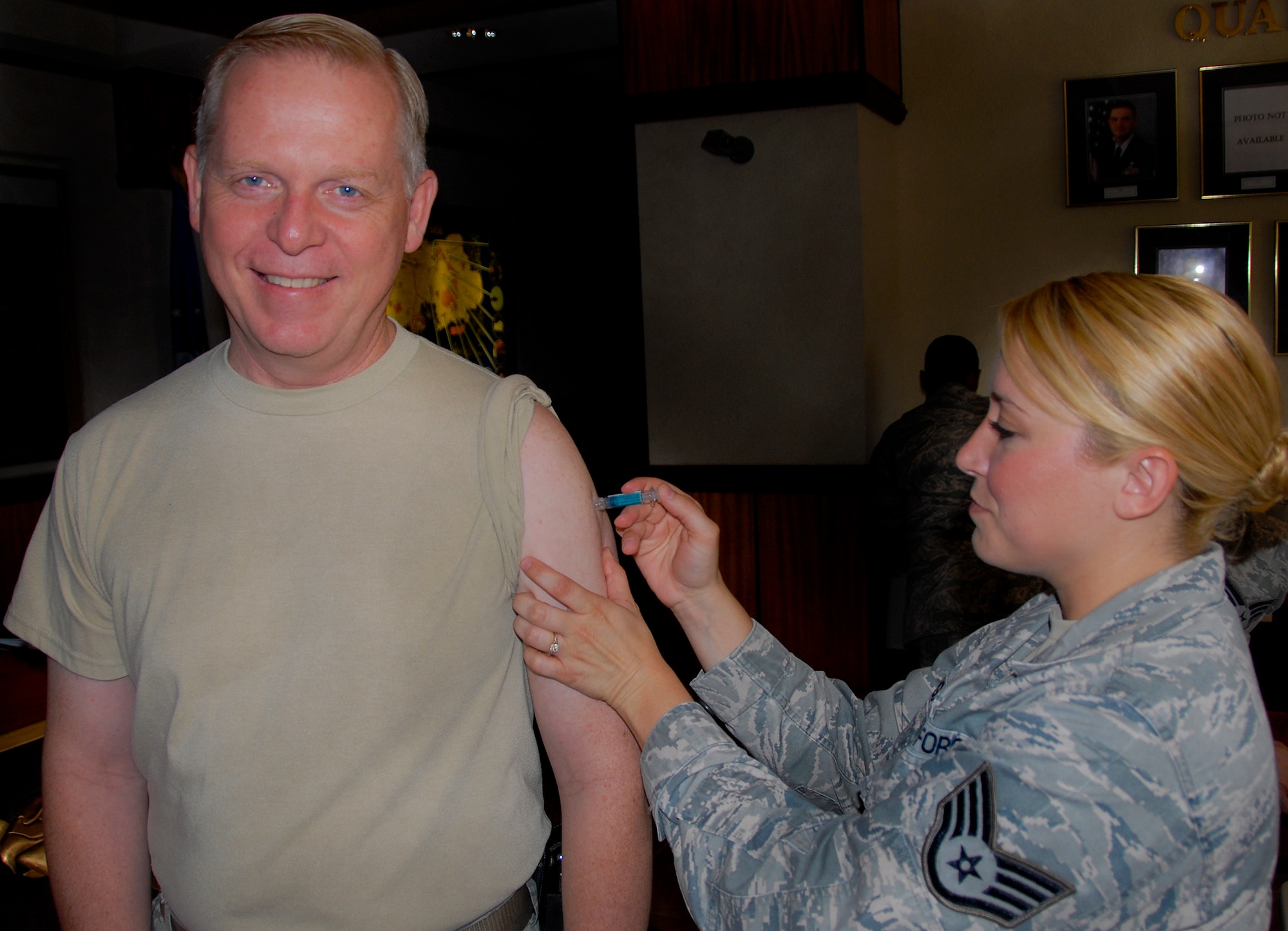 Brig. Gen. David Harris, the 96th Test Wing commander, receives his annual flu vaccination Sept. 19 at Eglin Air Force Base, Fla.  A mass influenza vaccination line for military members only is scheduled for Oct. 15 – 18 at the 413th Flight Test Squadron auditorium, building 439 (formerly the 9th SOS Auditorium) from 6 a.m. to 6 p.m. and will be on a first-come, first-served basis. The auditorium is located on West F Avenue, across from the library on the East side of the base.  (U.S. Air Force photo/Kevin Gaddie)