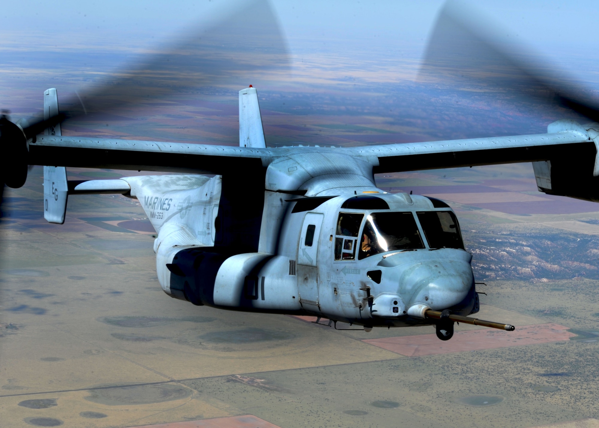 A CV-22 Osprey performs tactical maneuvers Sept. 26, 2013, over northern New Mexico. The Osprey flew as part of a joint training mission with the 522nd Special Operations Squadron and the 22nd Marine Expeditionary Unit. (U.S. Air Force photo/Senior Airman Ericka Engblom)