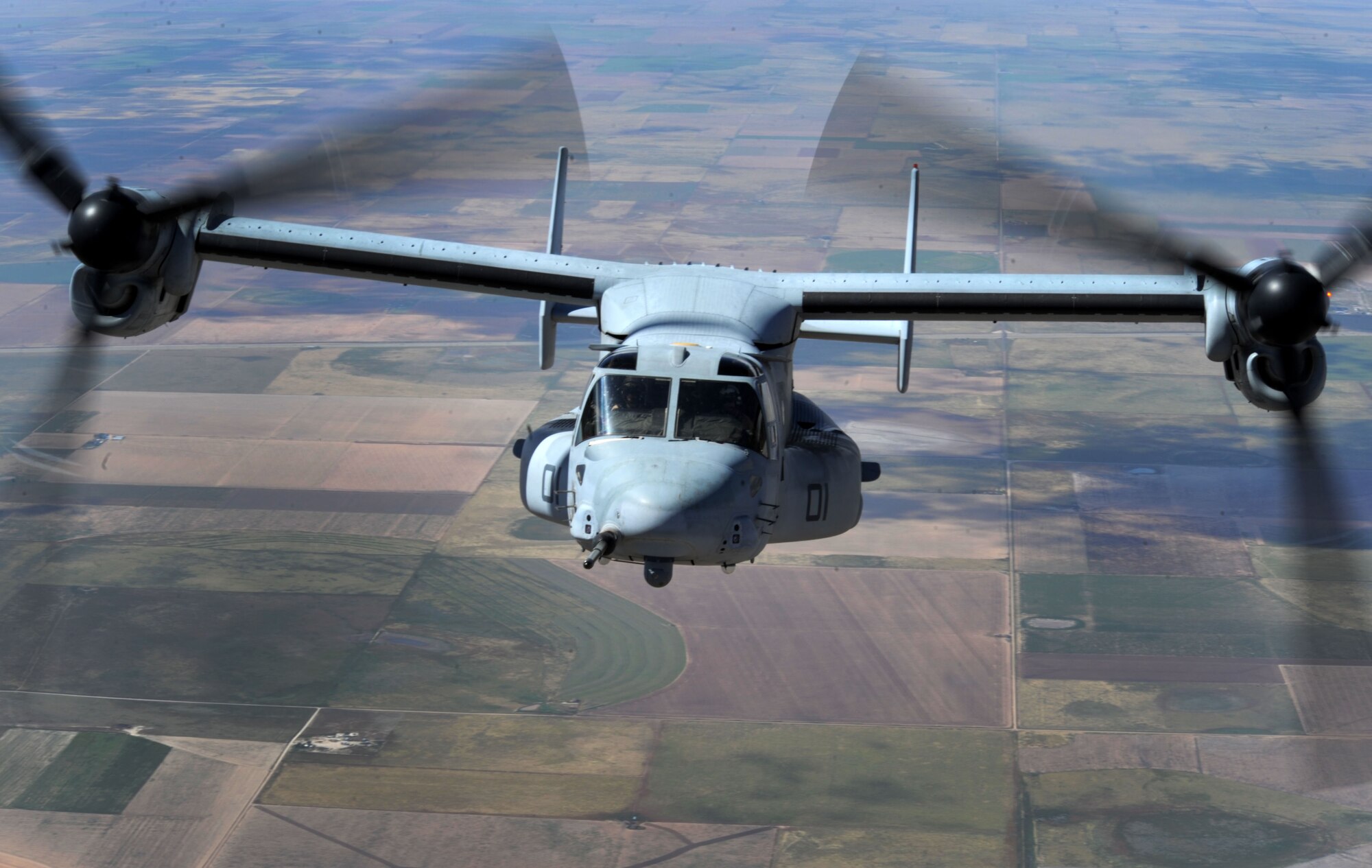 A CV-22 Osprey performs tactical maneuvers Sept. 26, 2013, over northern New Mexico. The Osprey flew as part of a joint training mission with the 522nd Special Operations Squadron and the 22nd Marine Expeditionary Unit. (U.S. Air Force photo/Senior Airman Ericka Engblom)