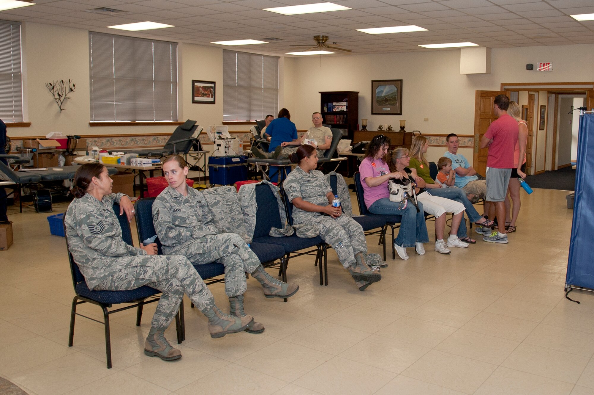 ALTUS AIR FORCE BASE, Okla. – Airmen and family members wait to donate blood at the Altus AFB blood drive inside the chapel activities room Sept. 27. The donors must be medically cleared before donating to ensure that their blood is able to be donated. The Oklahoma Blood Institute is a local organization that collects and donates blood to more than 140 medical facilities in Oklahoma. (U.S. Air Force photo by Senior Airman Dillon Davis/Released)