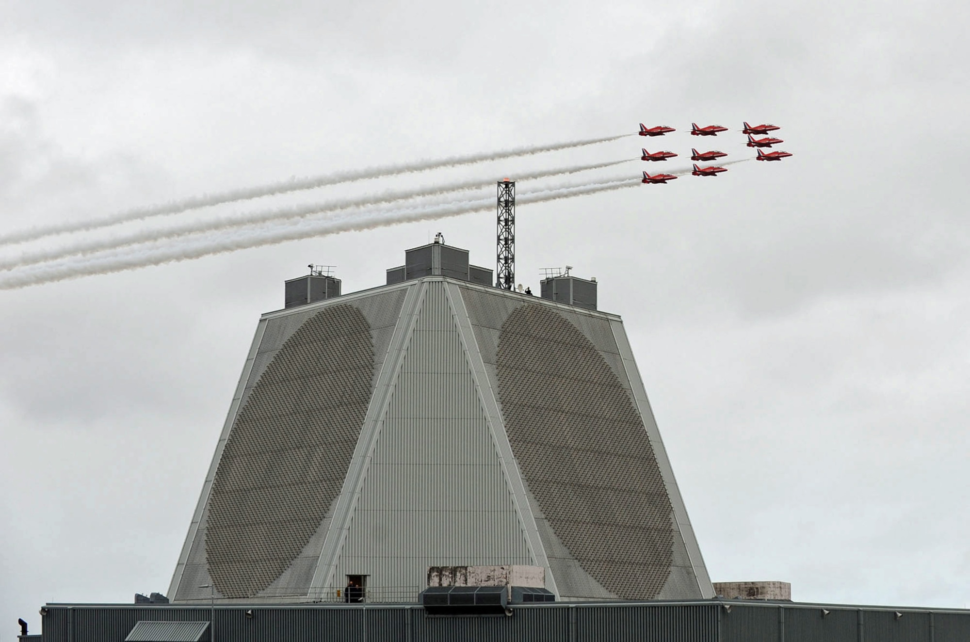 RAF FYLINGDALES, U.K. – The Royal Air Force Aerobatic Team, commonly known as the Red Arrows, helped celebrate the 50th anniversary of the Ballistic Missile Early Warning System Site III, located at Fylingdales, United Kingdom, Sept. 17. The BMEWS site supports the space surveillance network by detecting and tracking near-Earth space objects. While operated by U.K. personnel, the 21st Operations Group maintains a liaison officer at the location. (Courtesy photo)