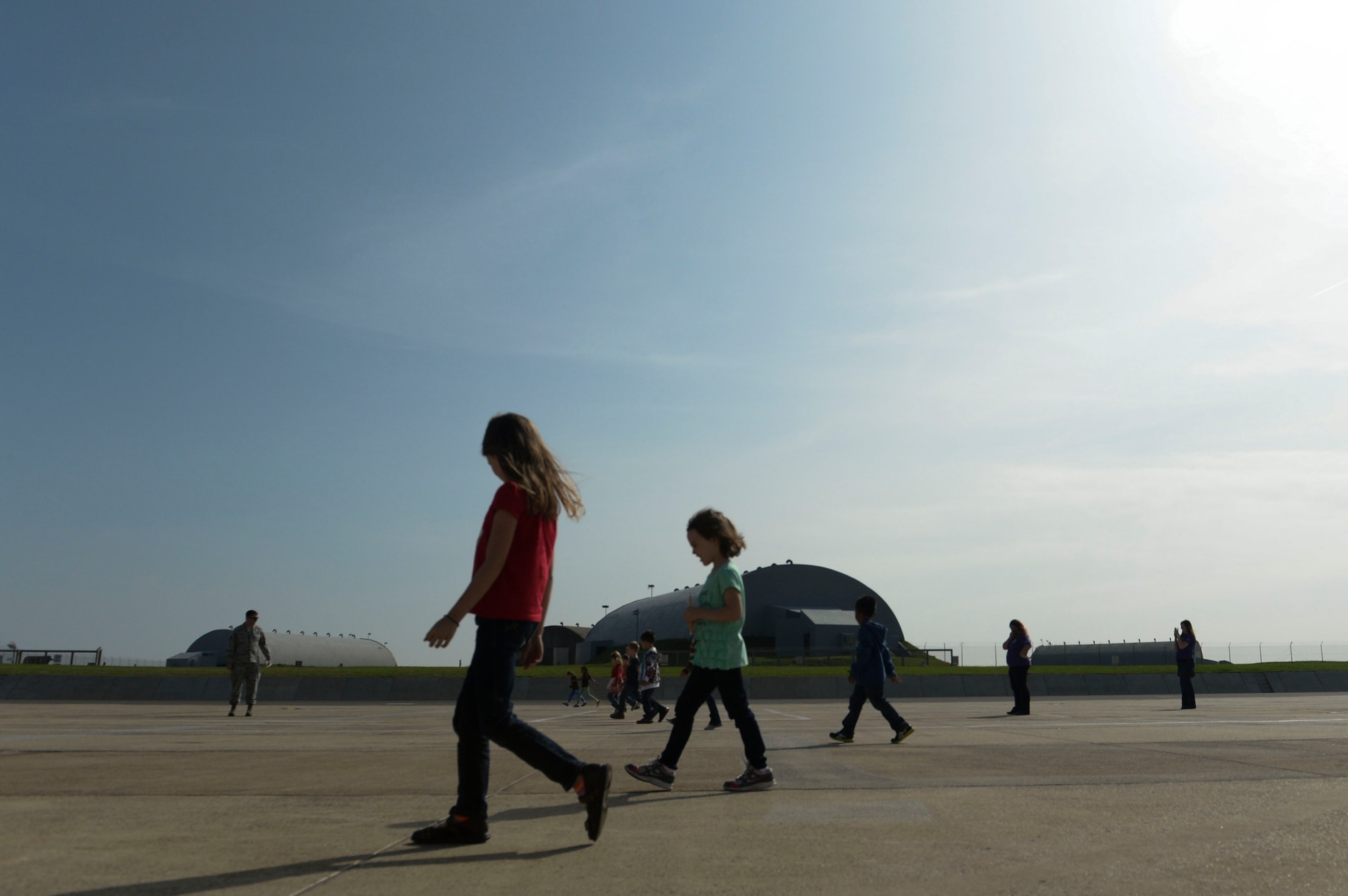 SPANGDAHLEM AIR BASE, Germany—School-Age Program children participate in a foreign object debris walk on the flightline Sept. 27, 2013. The SAP provides a full range of community based before and after school and summer programs that provide a safe, supervised and healthy environment for children. (U.S. Air Force photo by Senior Airman Rusty Frank/Released)