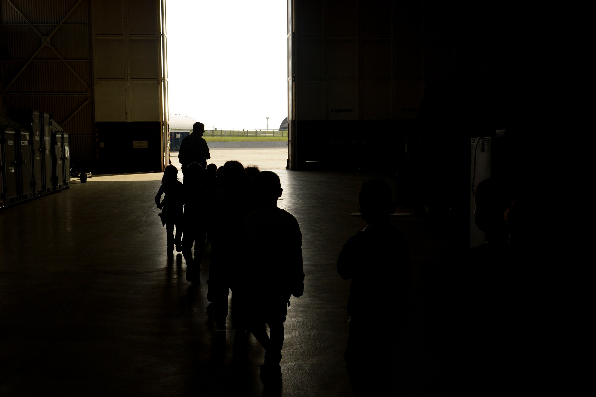 SPANGDAHLEM AIR BASE, Germany—School-Age Program children prepare to go on a foreign object debris tour of the flightline Sept. 27, 2013. The field trip served to teach children about different types of debris that could damage aircraft. (U.S. Air Force photo by Senior Airman Rusty Frank/Released)