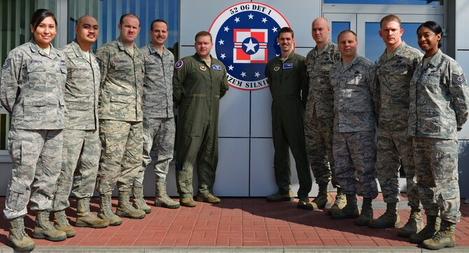 The ten Airmen assigned to the Aviation Detatchment at Lask Air Base, Poland mark the first enduring presence of U.S. military members on Polish soil. The Airmen consist of several mission-essential career fields to include: A C-130 Hercules and an F-16 Fighting Falcon instructor pilot, an aerospace ground equipment troop, a crew chief, maintenance officer, contracting officer, logistics Airman, two communications Airmen and a supply Airman. (U.S. Air Force photo/Airman 1st Class Ryan Conroy) 
